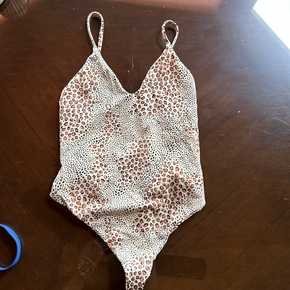 Mai swim wear no rips no tears